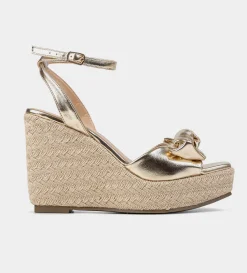 Online SANDALIA CUÑA YUTE MOÑO ORO Mujer Sandalias Y Plataformas
