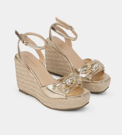 Online SANDALIA CUÑA YUTE MOÑO ORO Mujer Sandalias Y Plataformas